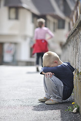 Image showing sad lonely boy on street