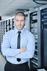 Image showing young it engineer in datacenter server room