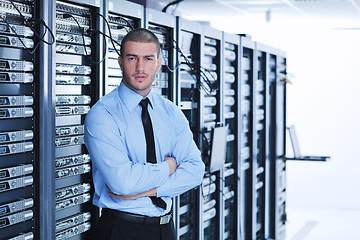 Image showing young it engineer in datacenter server room