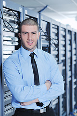 Image showing young it engineer in datacenter server room