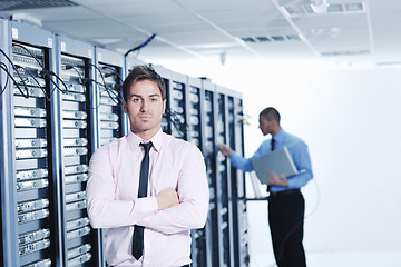 Image showing it engineers in network server room