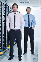 Image showing it engineers in network server room