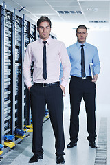 Image showing it engineers in network server room