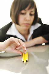 Image showing bosiness woman choosing perfect pencil