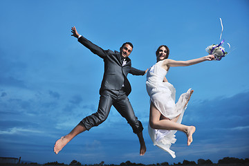 Image showing romantic beach wedding at sunset