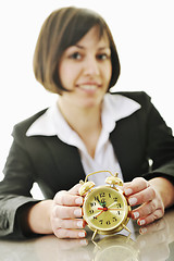 Image showing time maagement concept with business woman isolated on white