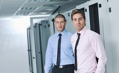 Image showing it engineers in network server room