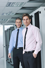 Image showing it engineers in network server room