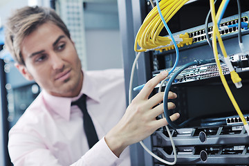 Image showing young it engineer in datacenter server room