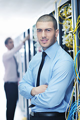 Image showing it engineers in network server room