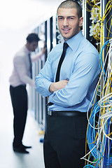 Image showing it engineers in network server room