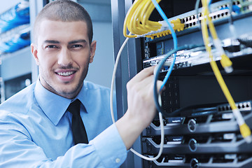 Image showing young it engineer in datacenter server room