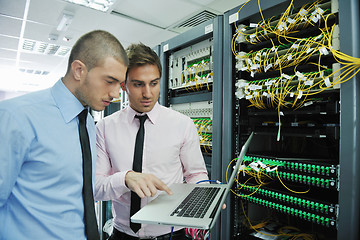 Image showing it engineers in network server room