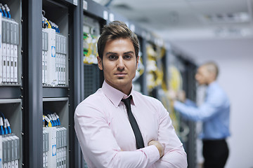 Image showing it engineers in network server room