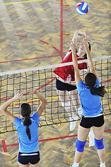 Image showing girls playing volleyball indoor game