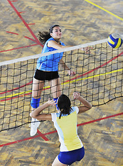 Image showing girls playing volleyball indoor game