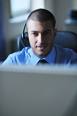 Image showing businessman with a headset