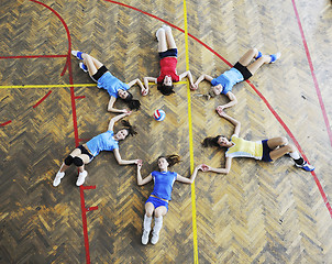 Image showing girls playing volleyball indoor game