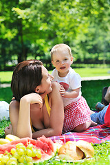 Image showing woman and baby playing at park