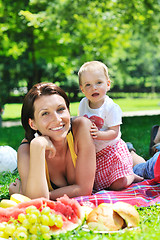 Image showing woman and baby playing at park