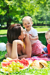 Image showing woman and baby playing at park