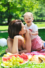 Image showing woman and baby playing at park