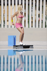 Image showing fitness exercise at poolside