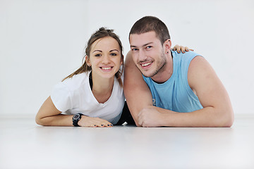 Image showing happy young couple fitness workout and fun