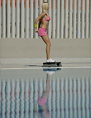 Image showing beautiful woman relax on swimming pool