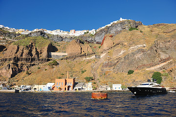 Image showing santorini island coast with luxury yacht