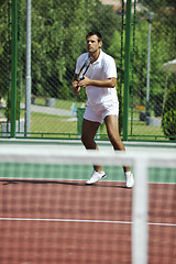 Image showing young man play tennis outdooryoung man play tennis outdoor