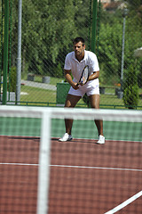 Image showing young man play tennis