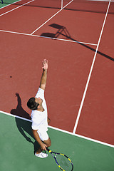 Image showing young man play tennis outdoor