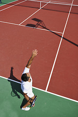 Image showing young man play tennis outdoor