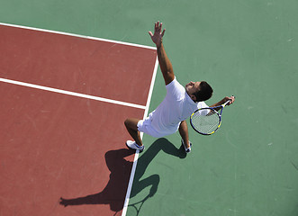 Image showing young man play tennis outdoor