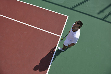 Image showing young man play tennis