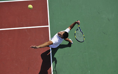 Image showing young man play tennis outdoor