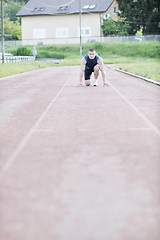 Image showing young athlete on start