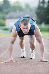 Image showing young athlete on start