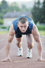 Image showing young athlete on start