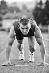 Image showing young athlete on start 