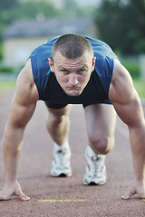 Image showing young athlete on start 