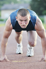 Image showing young athlete on start