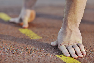 Image showing young athlete on start 