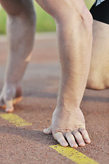 Image showing young athlete on start