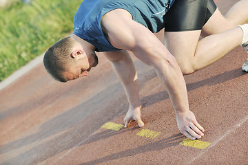 Image showing young athlete on start