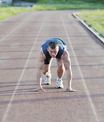Image showing young athlete on start 