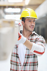 Image showing hard worker on construction site