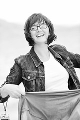 Image showing beautiful young woman on beach with scarf