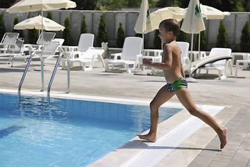 Image showing beautiful woman relax on swimming pool